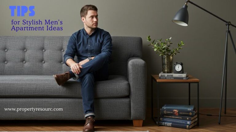 In Men’s Apartment EssentialsMan sitting on grey sofa in stylish apartment with books and floor lamp